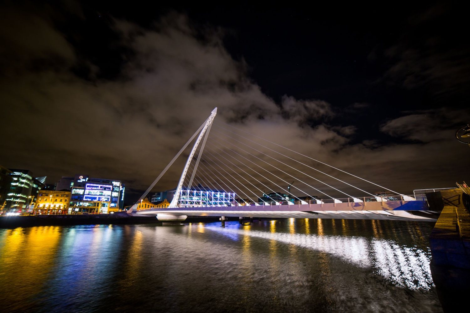 Samuel Beckett Bridge over the River Liffey, Dublin, lit up at night